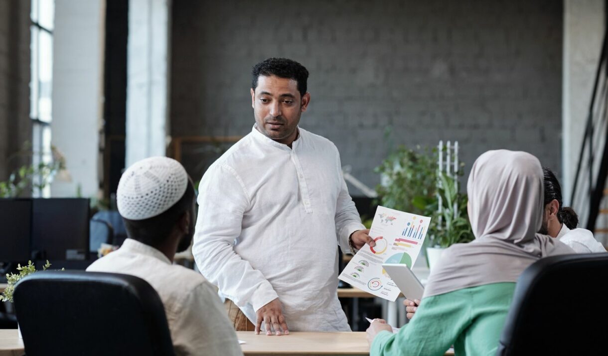 confident businessman with financial paper looking zwvq27j