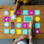 group of computer icon on the wooden table p77yusb